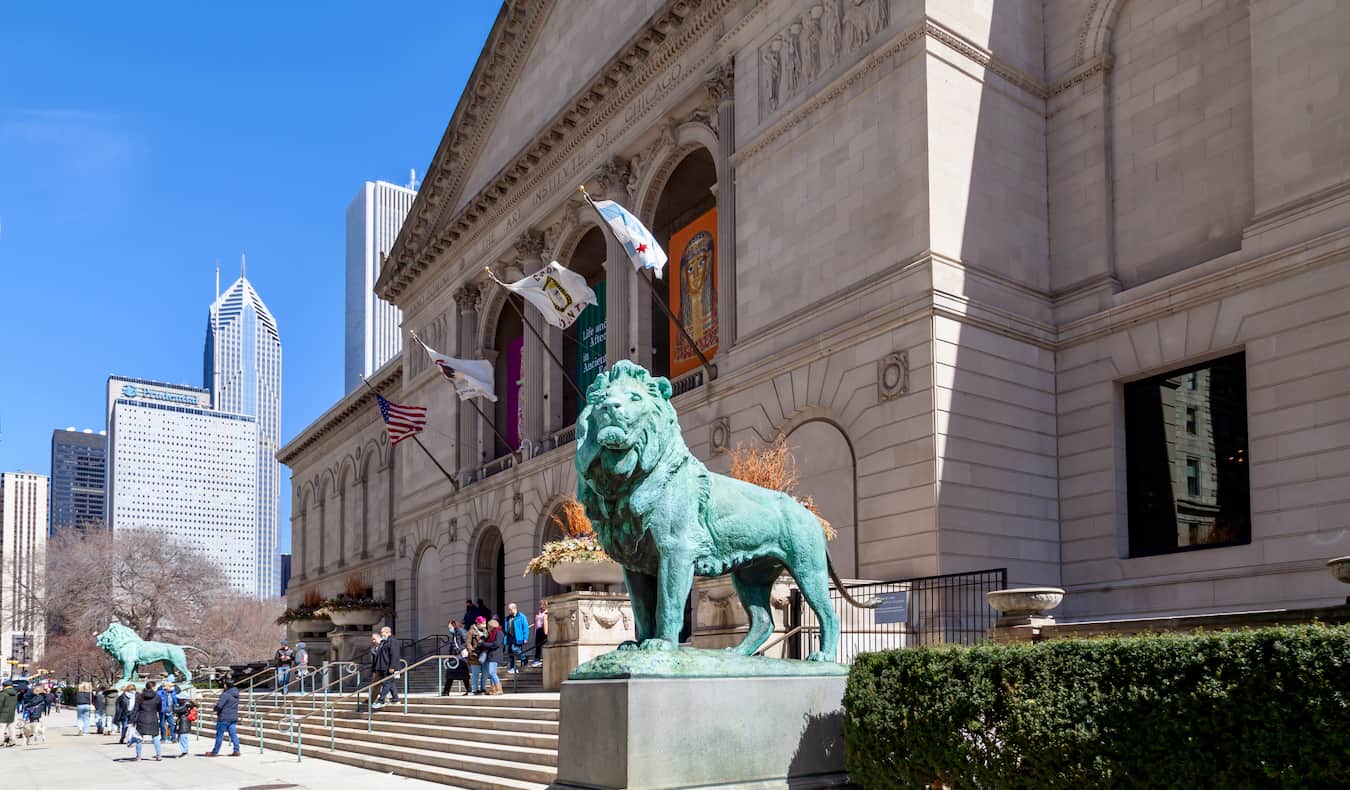 The exterior of the Art Institute of Chicago on a sunny day
